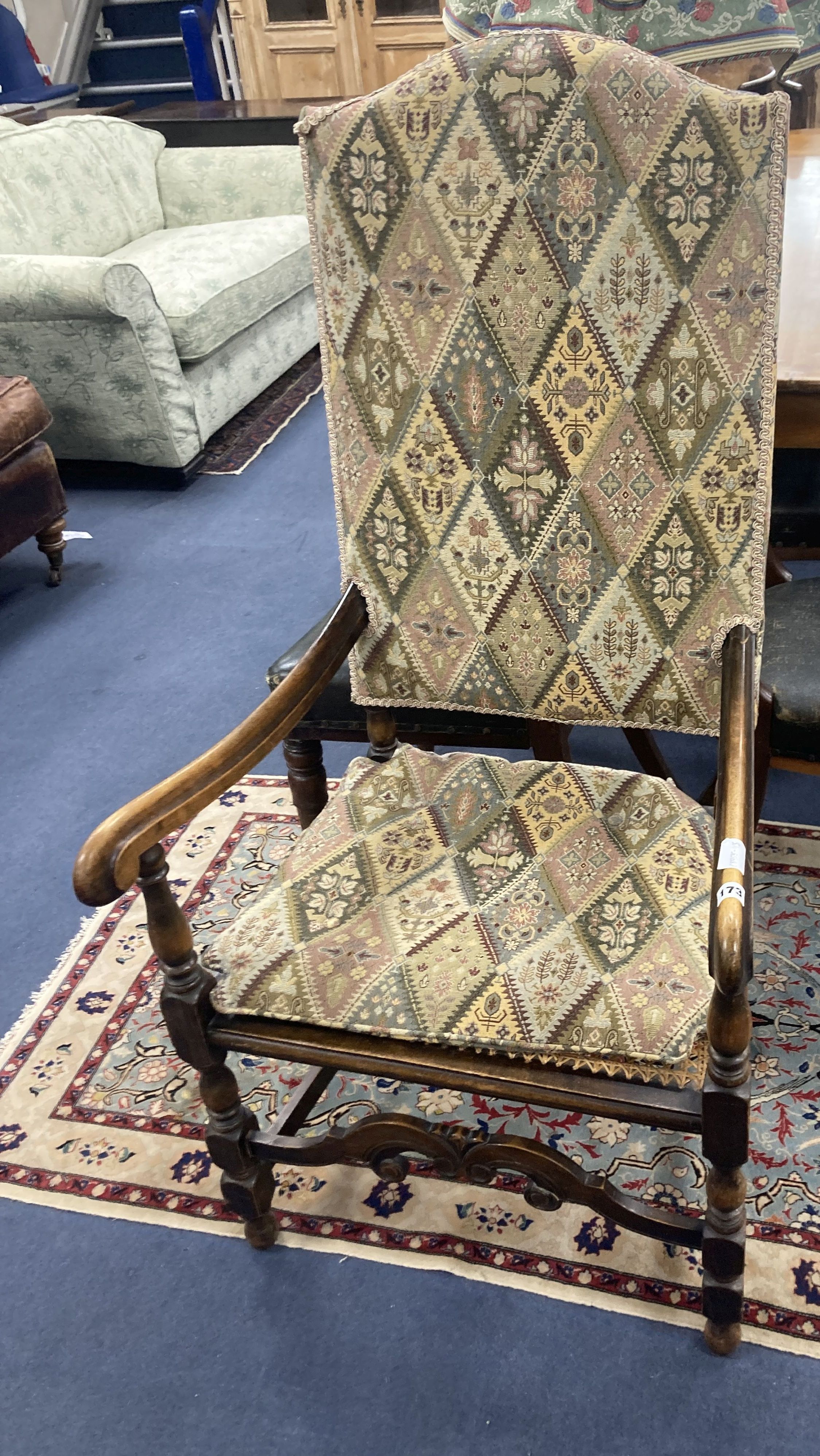 A Carolean design cane seat beech elbow chair